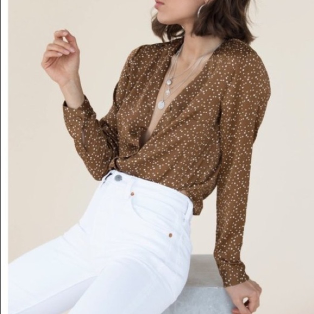 Beautiful polka-dotted blouse.